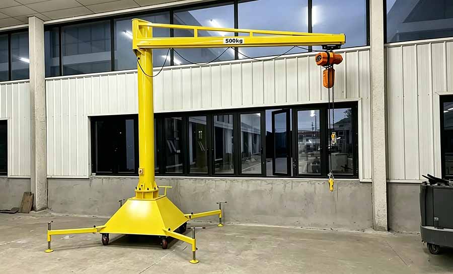 Portable jib crane on wheels with counterweight base Portable jib crane on wheels with counterweight base